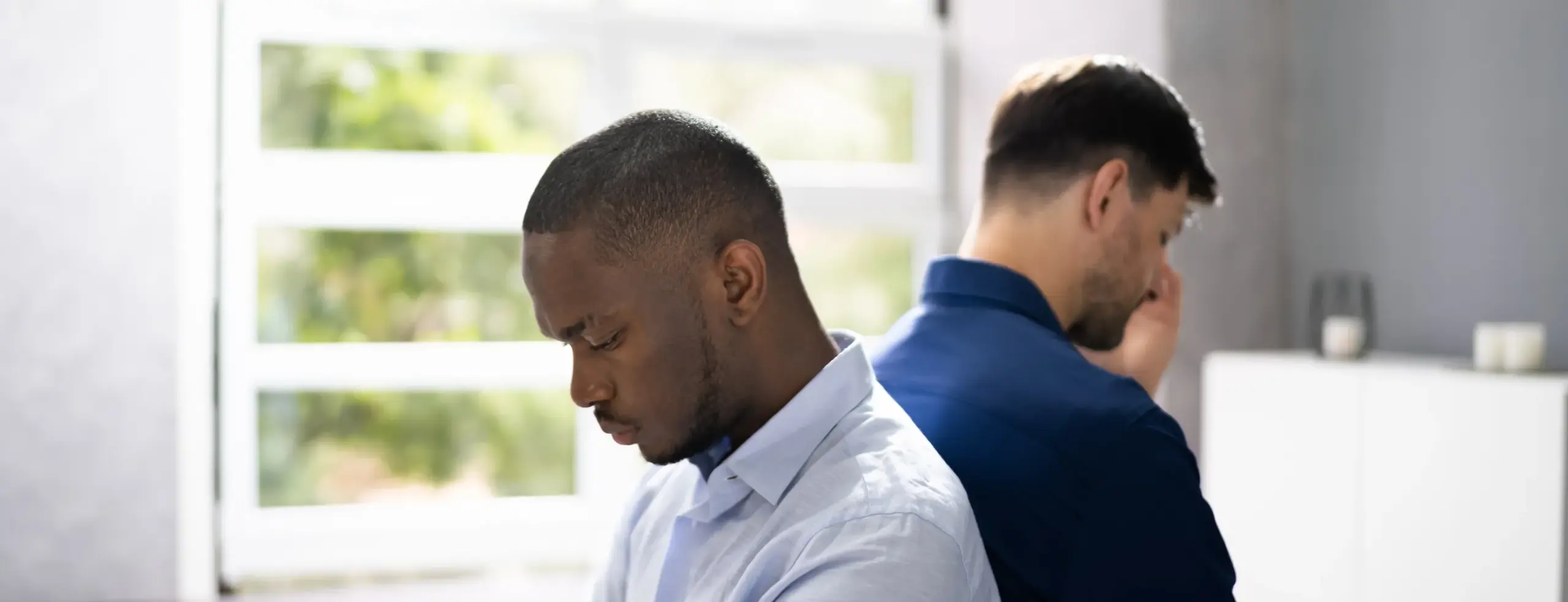 A couple that looks upset together.