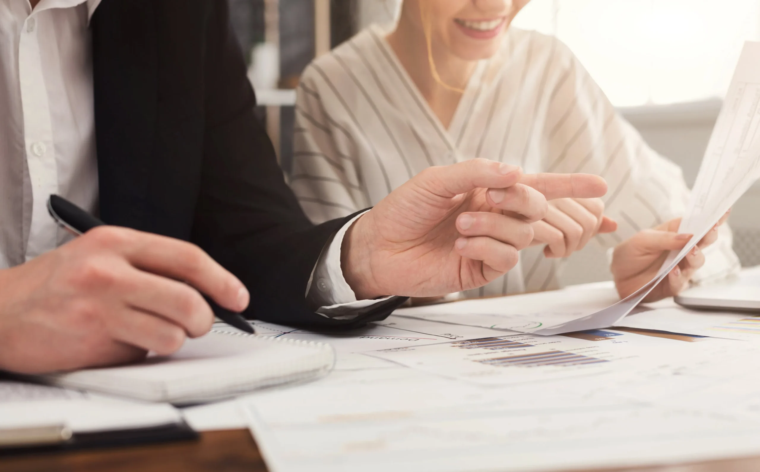 A couple looking at paperwork.