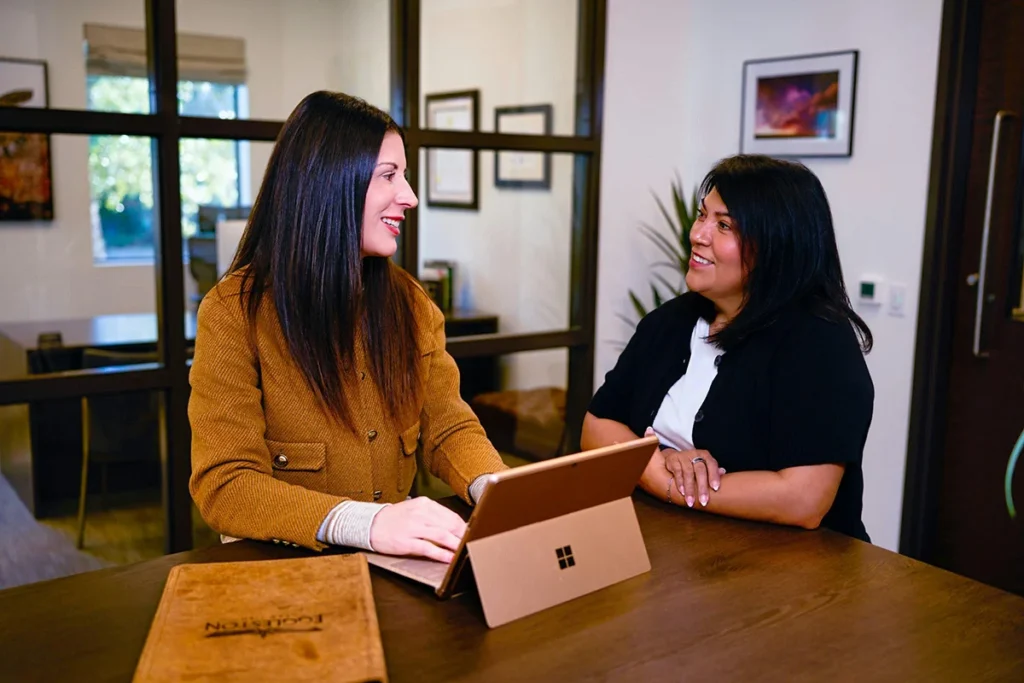 Janice Eggleston Family Divorce Lawyer in Austin TX with a client